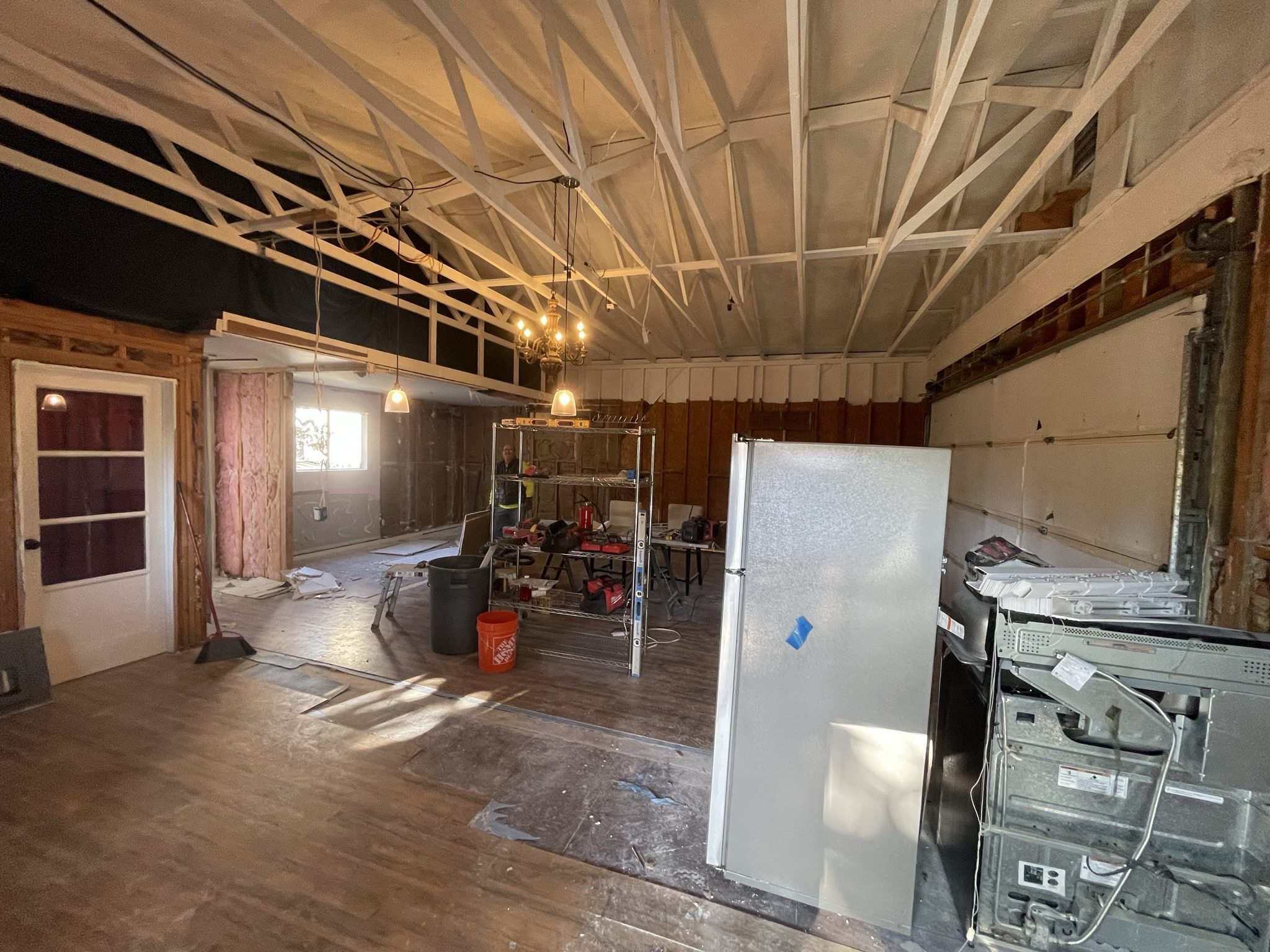 Construction process showing open interior framing during garage to ADU conversion