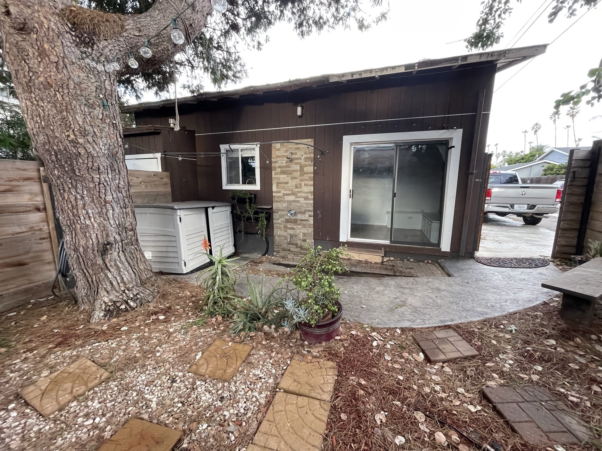 Completed detached garage ADU conversion with courtyard entry