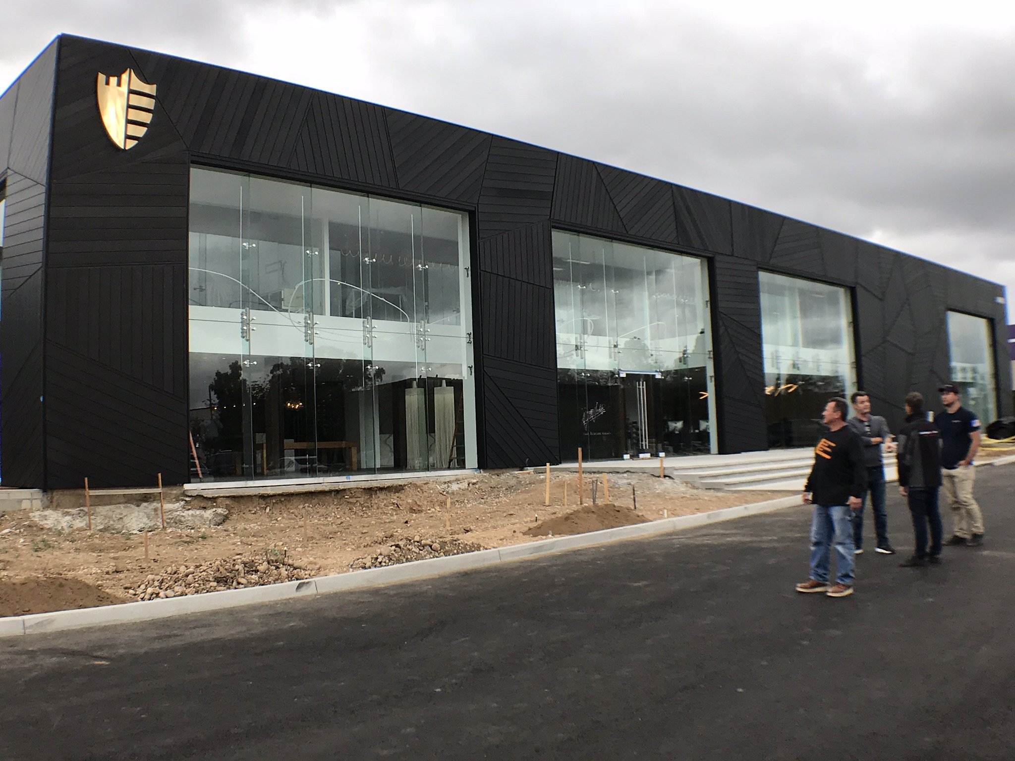 Completed commercial facade and paved access area