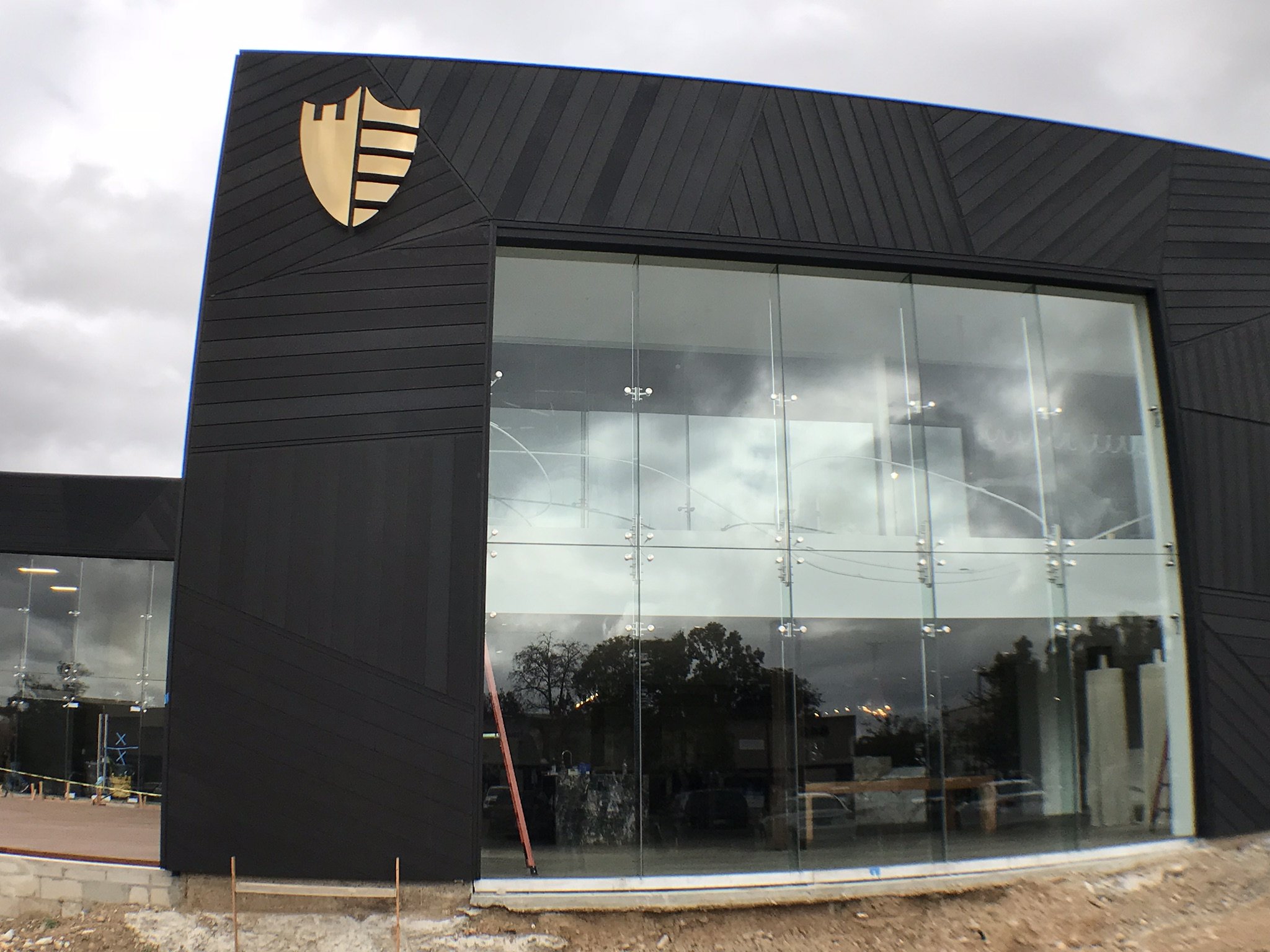 Close view of the completed large glass storefront