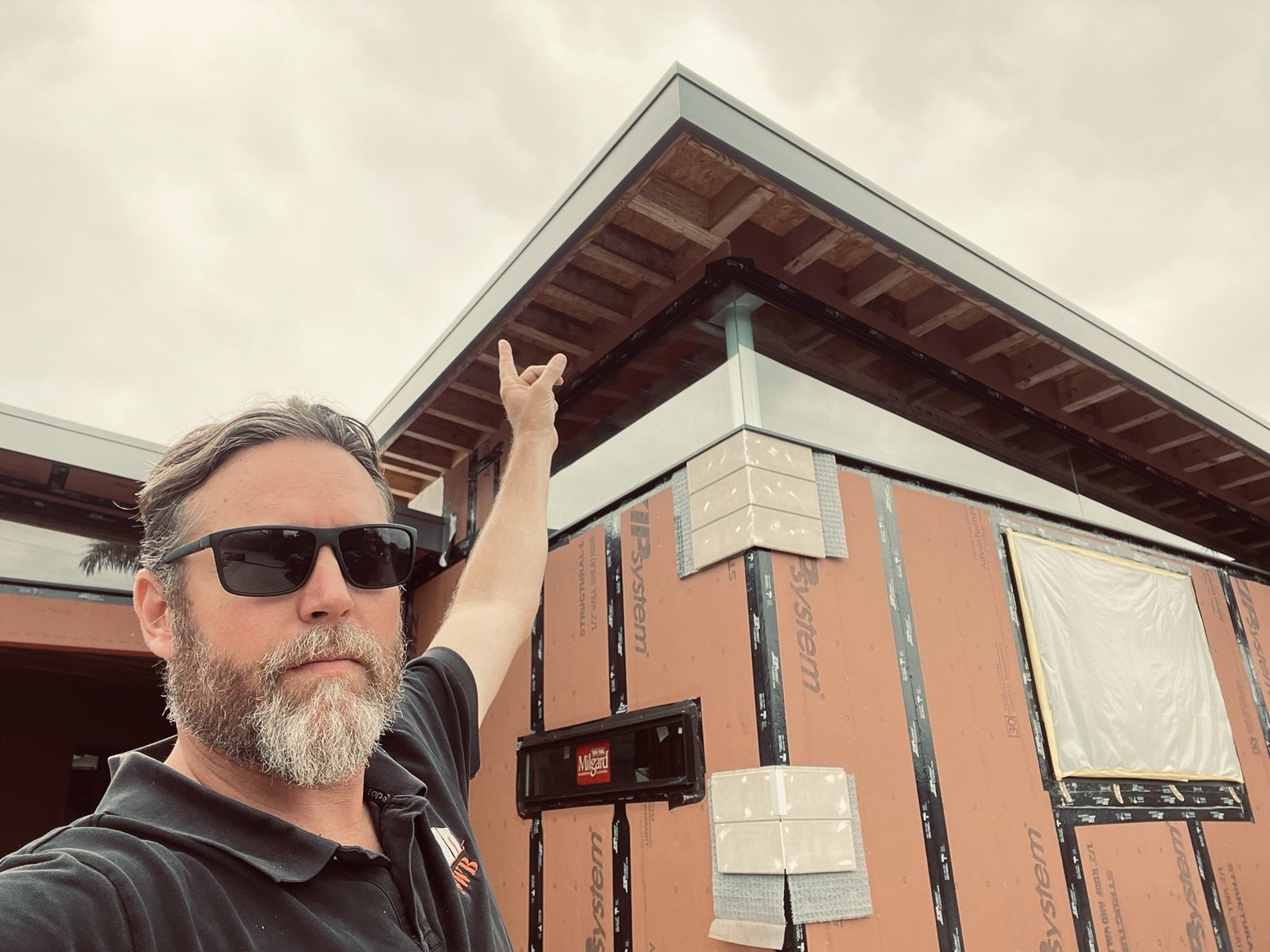 Standard West Builders field review of Grandview exterior metal cladding and roof detailing in Oceanside