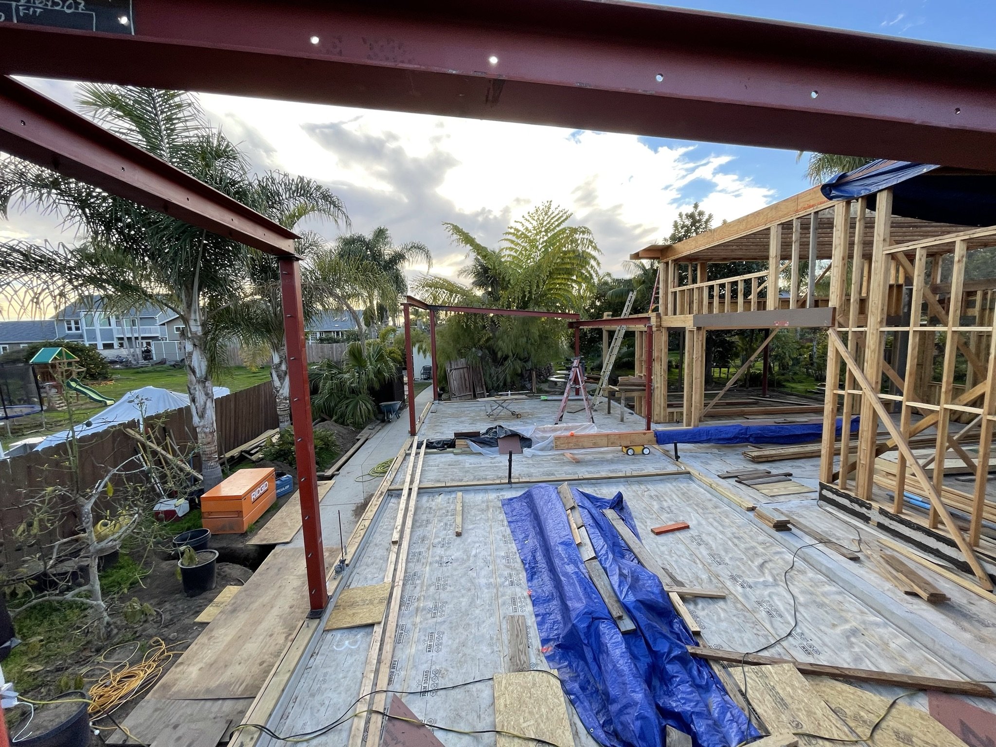 Grandview structural steel frame integrated with new wood wall framing during construction in Oceanside
