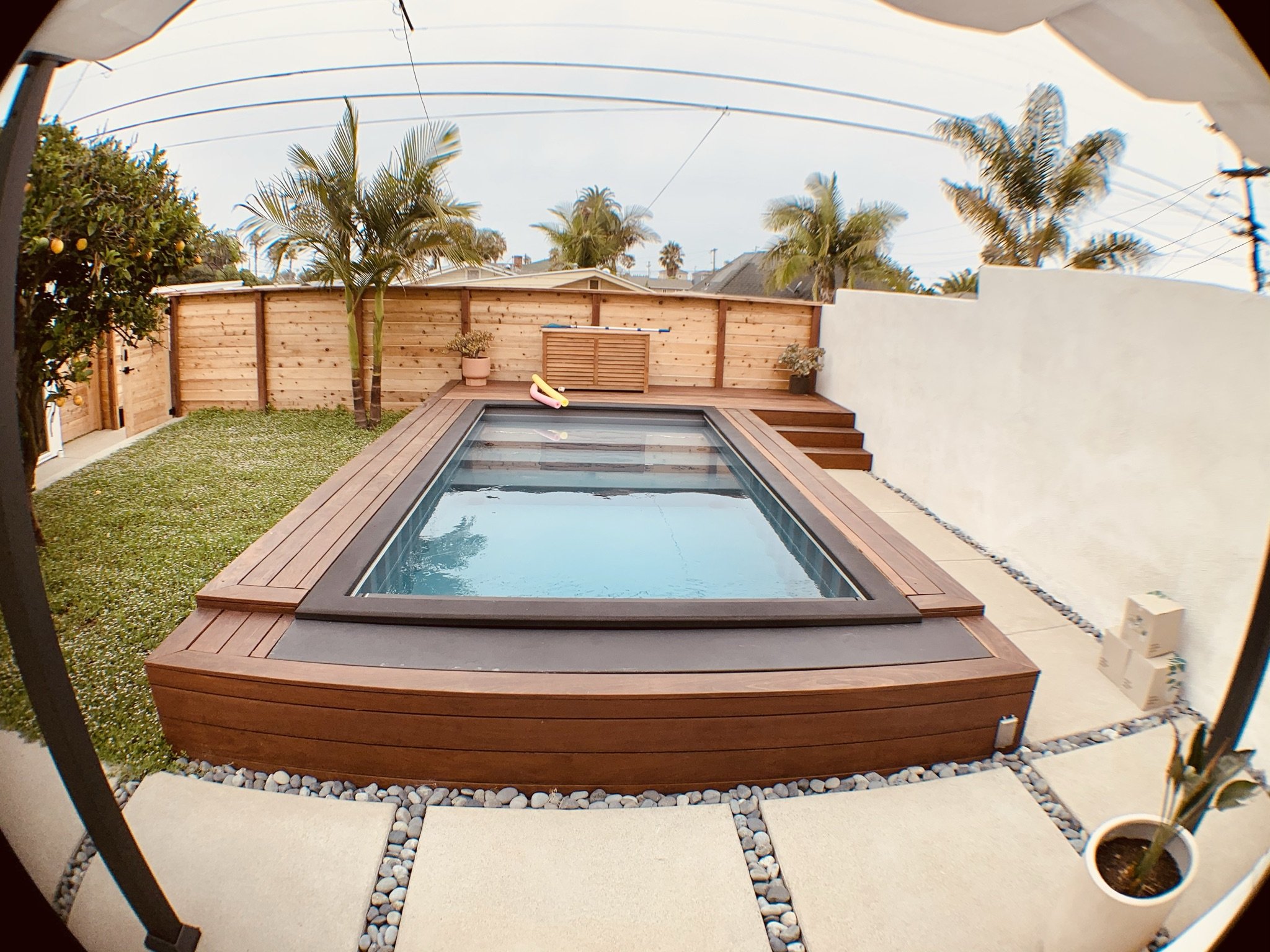 Finished raised spa and low-maintenance outdoor living area