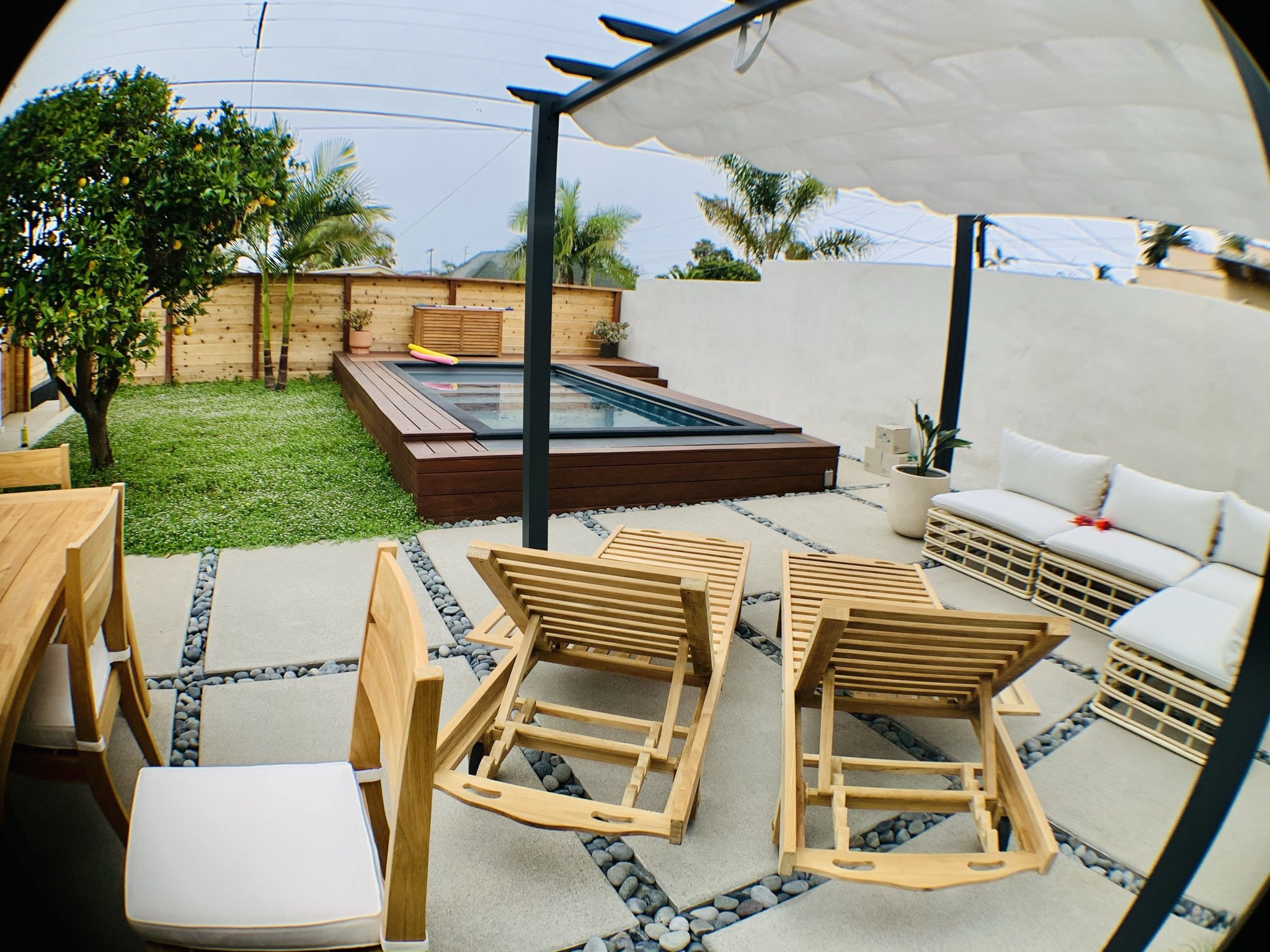 Finished outdoor seating area beside the raised spa