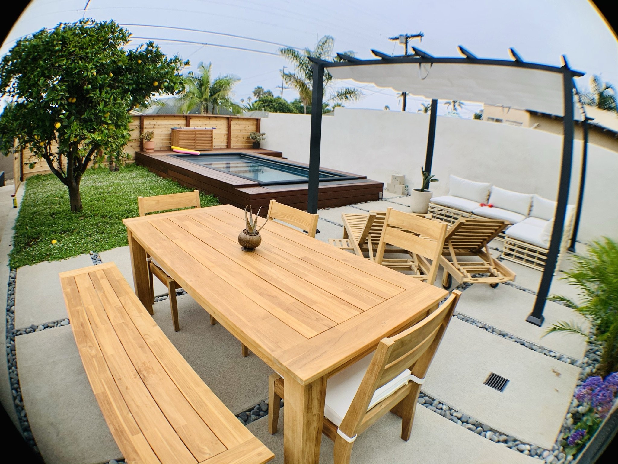 Completed outdoor dining patio and raised spa area