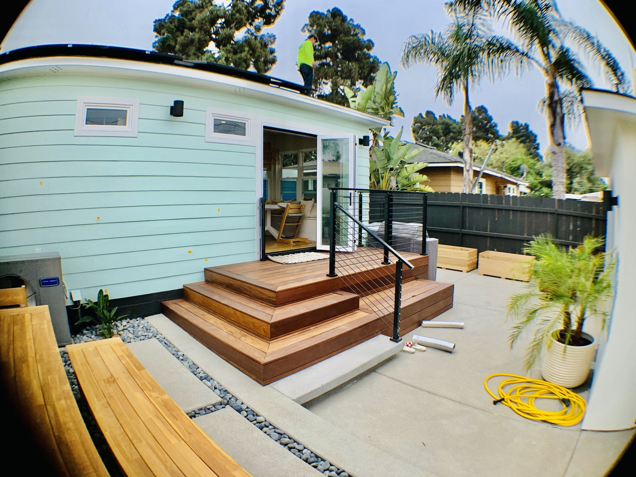 Completed exterior entry and deck transition