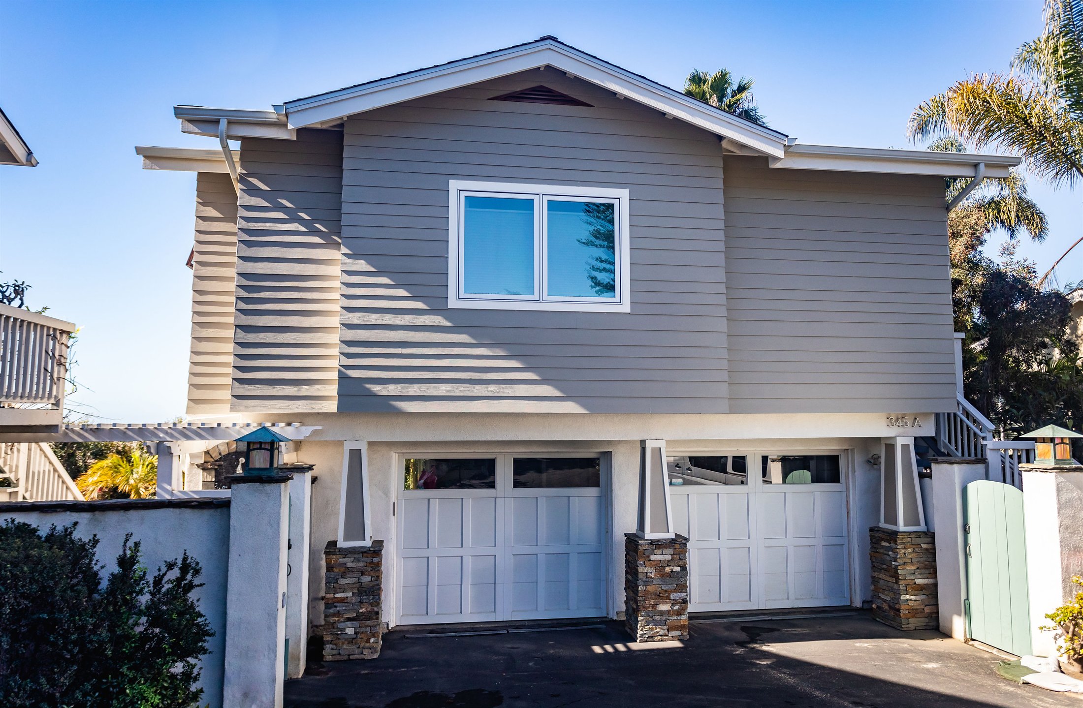 Completed residential exterior after the kitchen and interior remodel