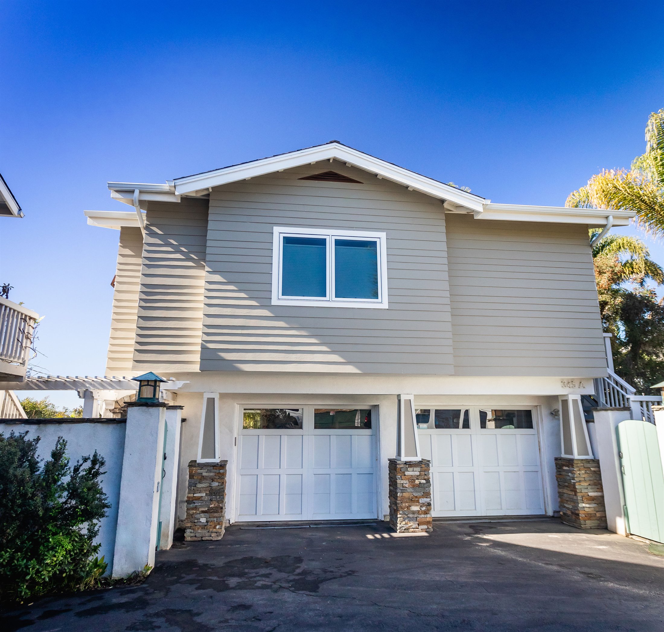 Finished home exterior and entry following the residential renovation
