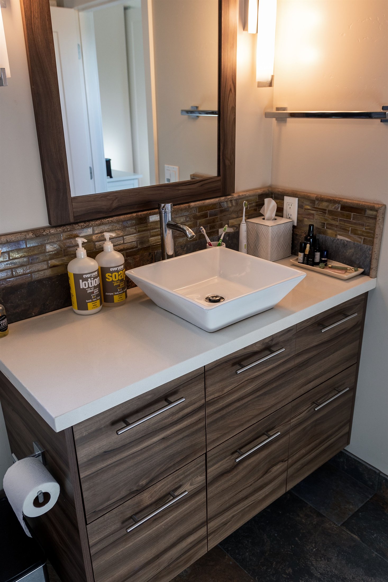 Completed bathroom shower with modern tile and glass enclosure