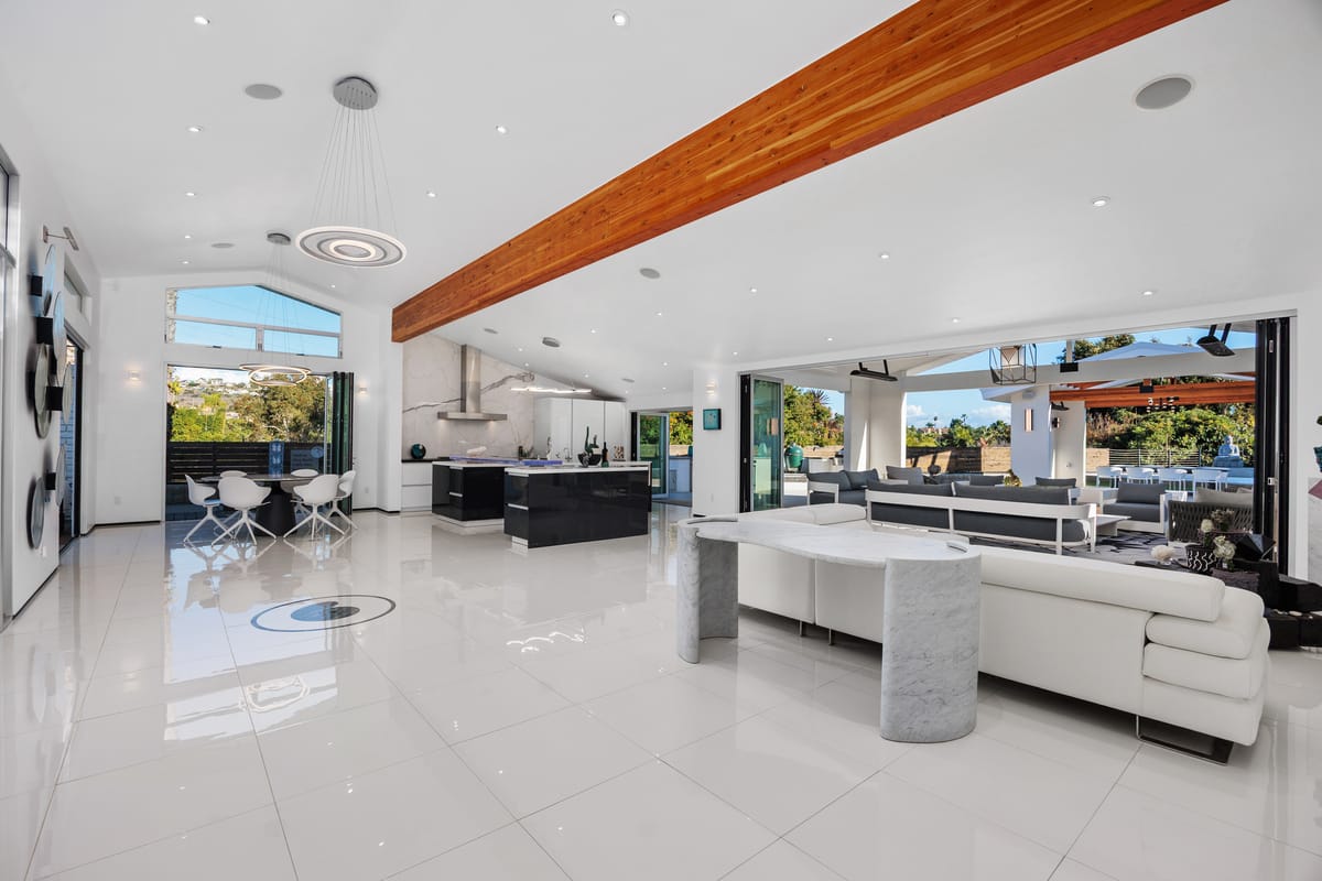 Estrella indoor-outdoor home remodel with open kitchen, living room and covered pavilion